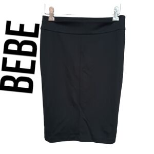 BEBE Bodycon mini skirt with Arrow detail size 6 EUC